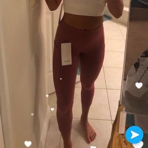 Size 2, pink/ deep blush lululemon leggings.